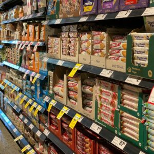 ultra processed foods green and red labeled plastic pack
