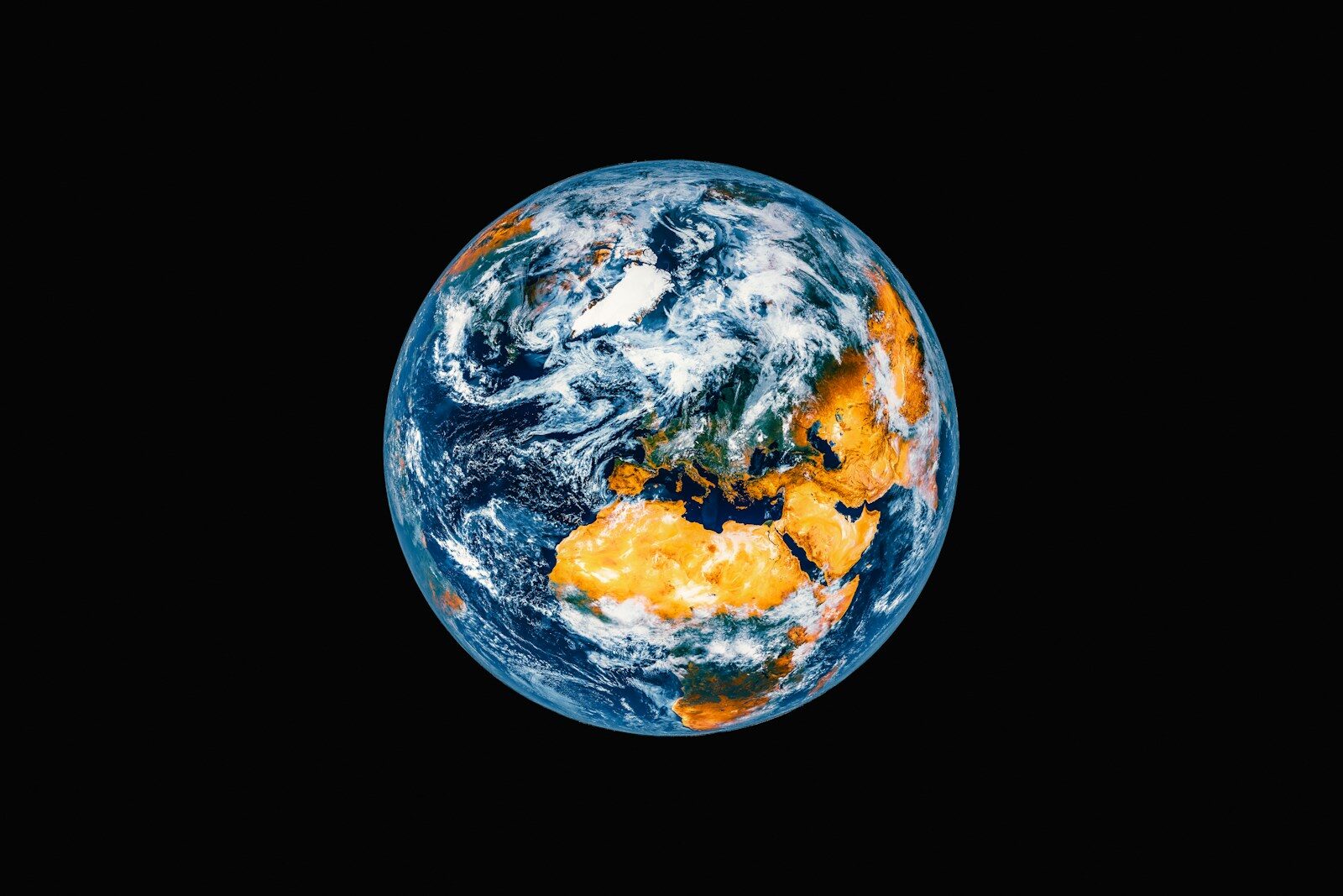 Planet earth seen from space with clouds and landmasses