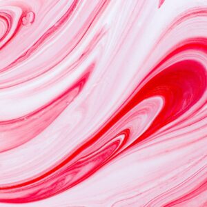 pink and white abstract image of peppermint candy
