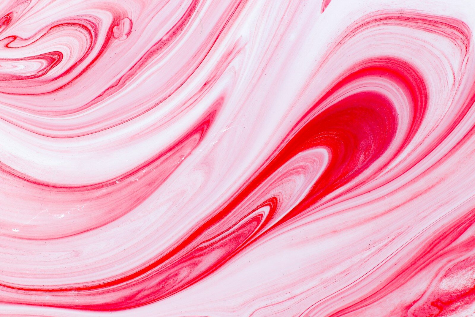 pink and white abstract image of peppermint candy